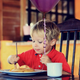 Illustration for article titled Child’s Loose Grasp On Balloon Only Thing Between Peace And Anarchy At Restaurant